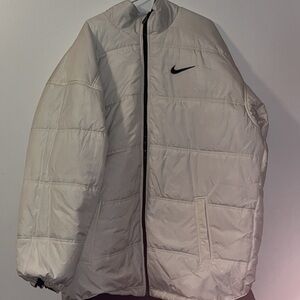 Nike Reverse White and Blue Puffer Jacket.  Size: Xl